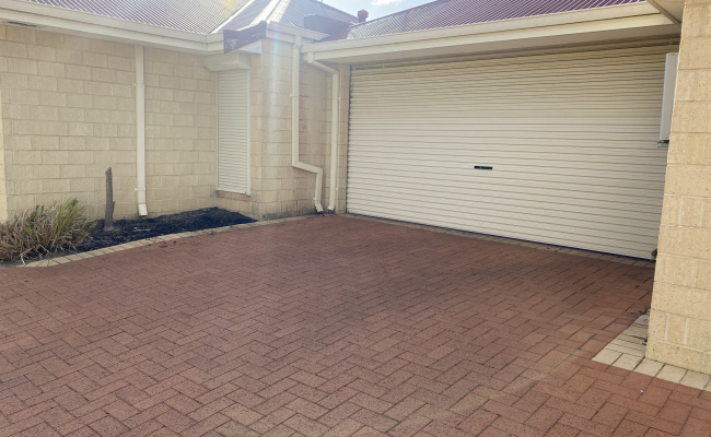 Secure parking space in a private carport