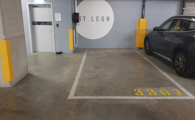 Secure extra large parking spot in Darling One for long-term rent