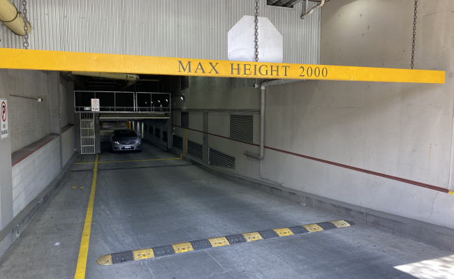 Indoor secure car space on Victoria Parade within Tribeca Apartments and close to city & hospitals