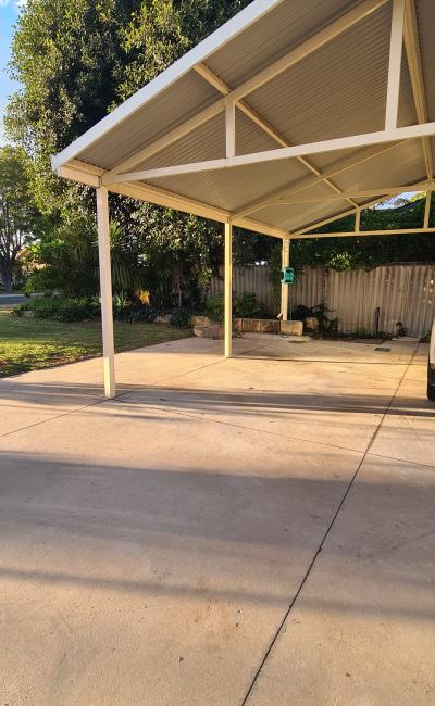 Carport parking space, close to Airport, with security camera