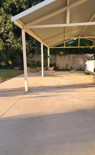Carport parking space, close to Airport, with security camera