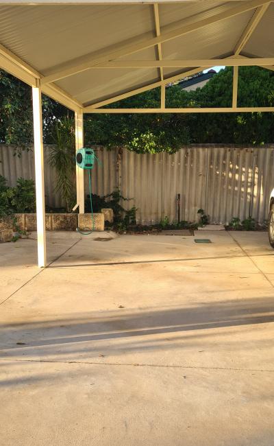 Carport parking space, close to Airport, with security camera