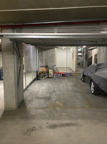 Private parking in underground carpark near train station
