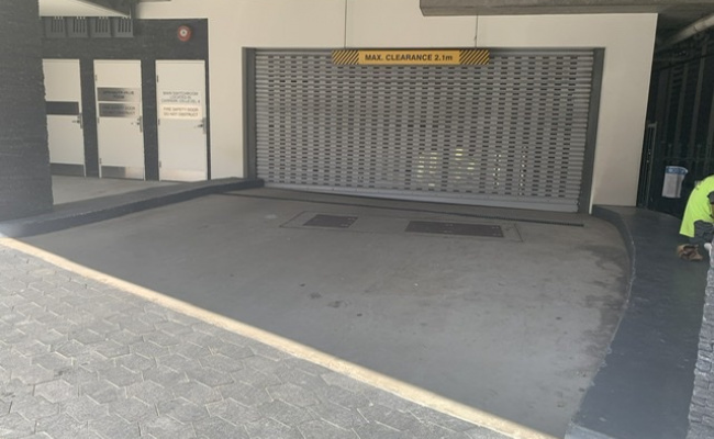 Secure security building parking space available now