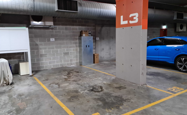 A cozy private parking space on Harris Street! Behind a roller door sectioned off part of the garage