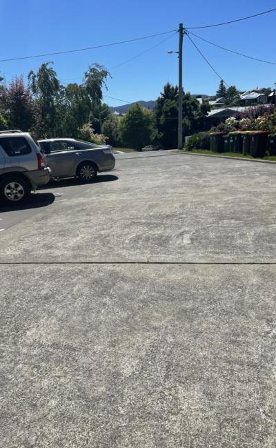 New town outdoor private lot parking 10mins walk to cbd 5min bus ride ever 7-10mins