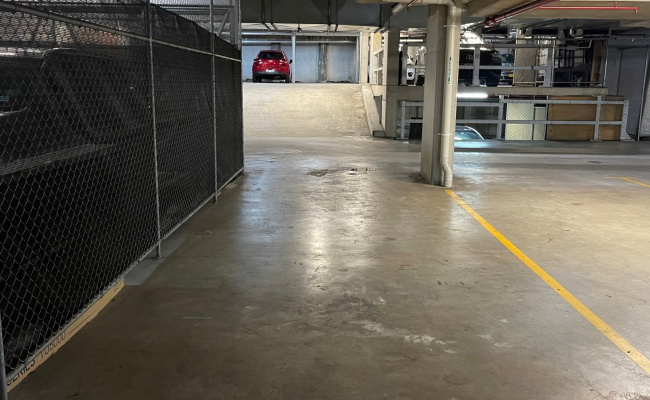 Double length car space in secure garage for lease